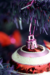 Image showing Christmas ornaments on tree.