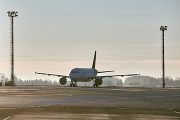 Image showing Plane parked at an airport