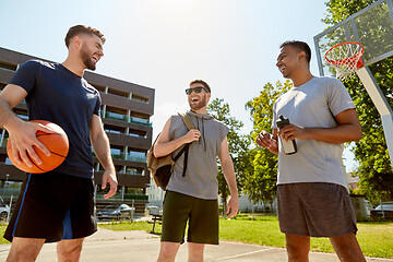 Image showing group of male friends going to play basketball