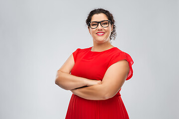 Image showing happy woman in glasses with crossed arms