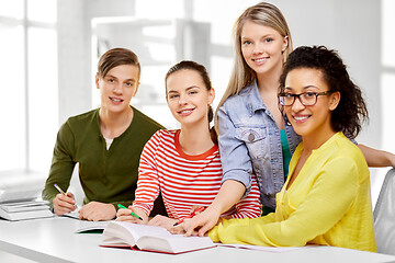 Image showing high school students with books and notebooks