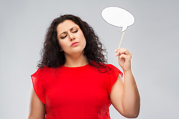 Image showing unhappy woman in red dress holding speech bubble