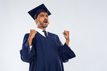 Image showing happy indian graduate student celebrating success