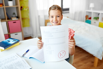 Image showing student girl with school test good mark at home