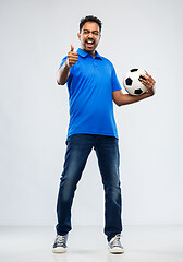 Image showing football fan with soccer ball showing thumbs up