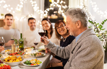 Image showing happy family having dinner party at home