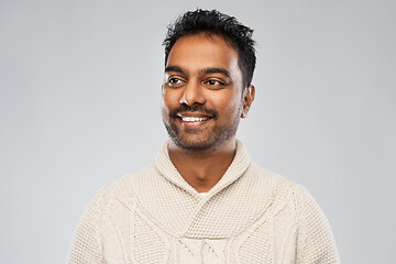 Image showing indian man in knitted sweater over gray background