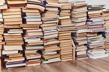 Image showing Wall of books piled up