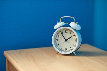 Image showing Alarm Clock on a Shelf