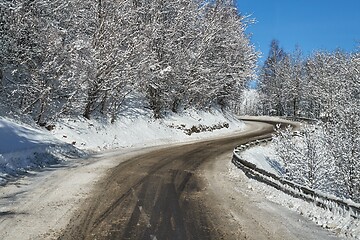 Image showing Driving in snowy mountains