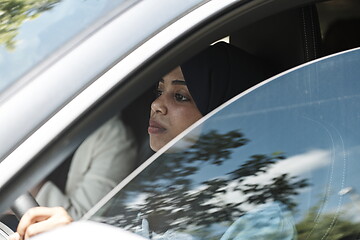 Image showing Arabic Woman Traveling By Car