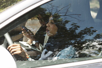 Image showing Arabic Woman Couple Traveling By Car