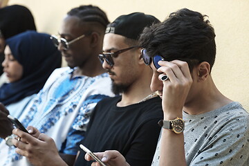 Image showing multiethnic startup business people group using smart phones