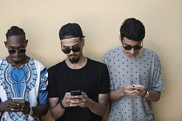 Image showing multiethnic startup business people group using smart phones