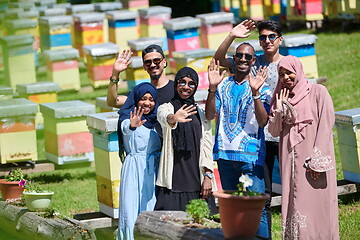 Image showing people group visiting local honey production farm