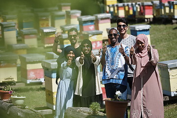 Image showing people group visiting local honey production farm