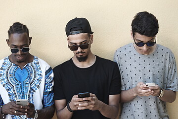 Image showing multiethnic startup business people group using smart phones