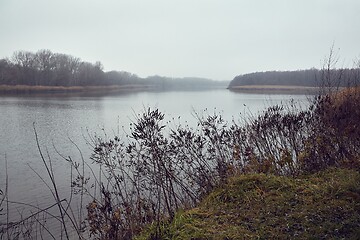 Image showing Misty autumn river landscape