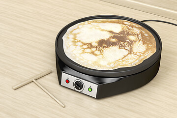 Image showing Electric pancake maker in the kitchen