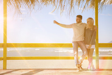 Image showing Couple chating and having fun at beach bar