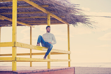 Image showing Young man enjoying the warm autumn day