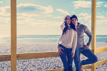 Image showing Couple chating and having fun at beach bar