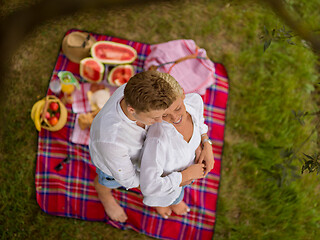 Image showing top view of couple enjoying picnic time