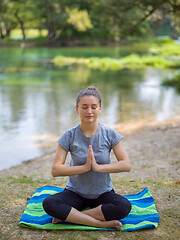 Image showing woman meditating and doing yoga exercise