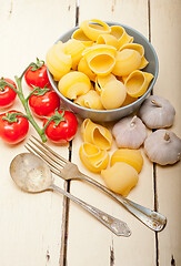 Image showing Italian snail lumaconi pasta with tomatoes