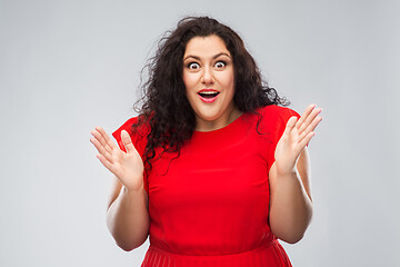 Image showing happy surprised woman in red dress