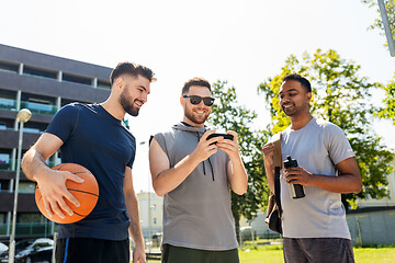 Image showing men with smartphone at basketball playground