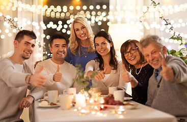 Image showing happy family having tea party at home