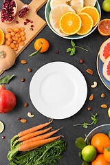 Image showing plate, vegetables and fruits on on slate table