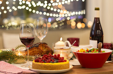 Image showing food and drinks on christmas table at home