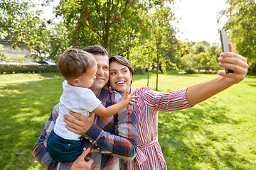 Image showing happy family taking selfie at summer park