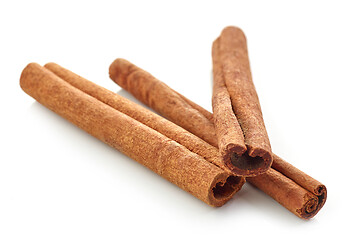 Image showing cinnamon sticks on white background