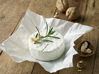 Image showing fresh brie cheese and walnuts