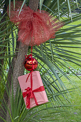 Image showing Christmas decoration with with red Christmas ball and a gift pac