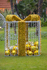 Image showing Christmas gift boxes with ball in a city park