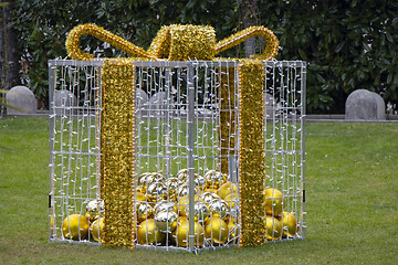 Image showing Christmas decoration as gift boxes with Christmas balls in a cit