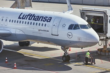 Image showing Airplane arriving at the terminal