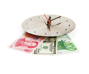 Image showing currency on a clock