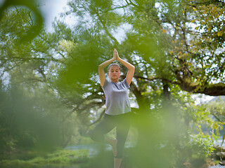 Image showing woman meditating and doing yoga exercise