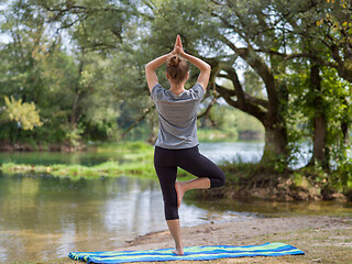 Image showing woman meditating and doing yoga exercise