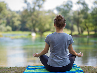 Image showing woman meditating and doing yoga exercise