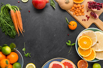 Image showing different vegetables and fruits on on slate table