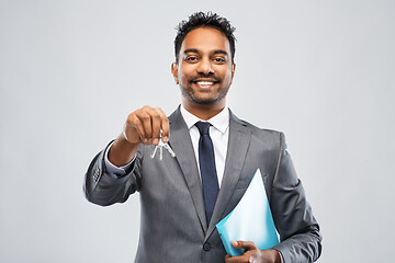 Image showing indian man realtor with key and folder