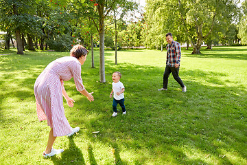 Image showing happy family having fun at summer park