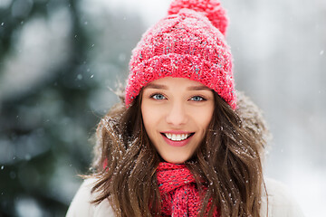 Image showing smiling teenage girl outdoors in winter