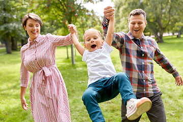 Image showing happy family having fun at summer park